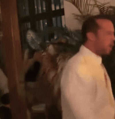 Man In White Shirt And Tie Dancing GIF