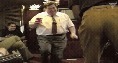 Man In White Shirt And Tie Dancing With Red Cup GIF