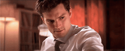 Man In White Shirt And Tie Looking At Camera GIF