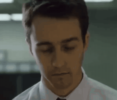 Man In White Shirt And Tie Looking Down GIF