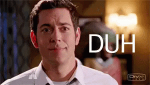 Man In White Shirt And Tie Making Funny Face With Word Duh GIF