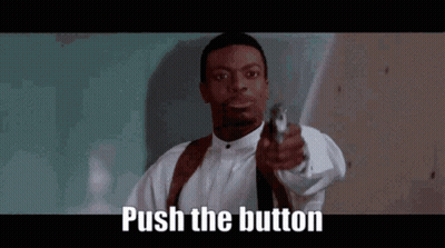 Man In White Shirt And Tie Pointing Gun GIF