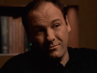Man In White Shirt And Tie Sitting GIF