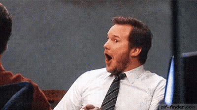 Man In White Shirt And Tie Sitting With Mouth Open GIF