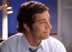 Man In White Shirt And Tie Smiling GIF