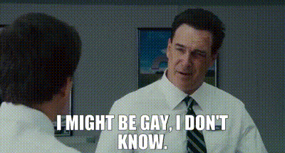 Man In White Shirt And Tie Talking To Another Man In Office GIF