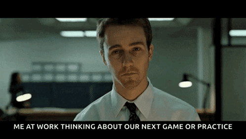 Man In White Shirt And Tie Thinking About Next Game GIF