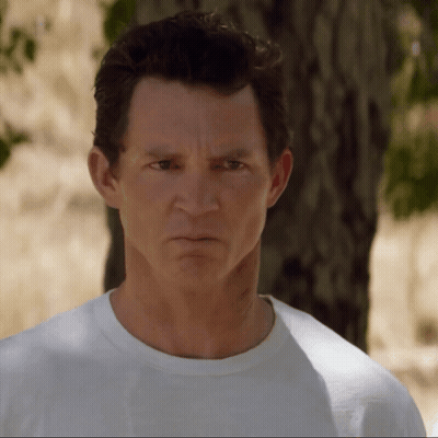 Man In White Shirt Angry At Camera GIF
