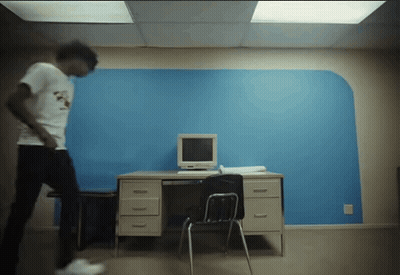 Man In White Shirt At Desk With Computer GIF