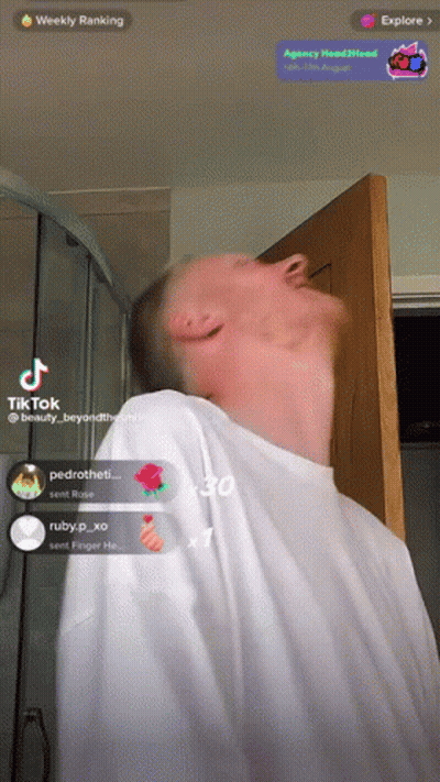 Man In White Shirt At Door With Weekly Ranking GIF