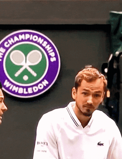 Man In White Shirt At Wimbledon Sign GIF