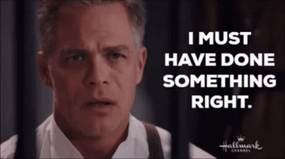 Man In White Shirt Behind Bars Says I Must Have Done Something Right GIF