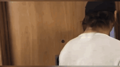 Man In White Shirt, Black Hat At Door GIF