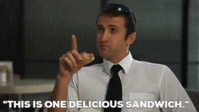Man In White Shirt Black Tie Eating Sandwich This Is One Delicious Sandwich GIF