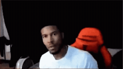 Man In White Shirt Blowing Bubble GIF