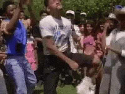 Man In White Shirt Dancing Before Crowd GIF