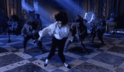 Man In White Shirt Dancing Before Werewolves GIF