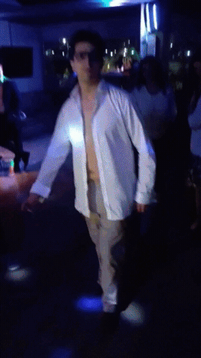 Man In White Shirt Dancing GIF