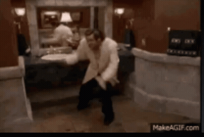 Man In White Shirt Dancing In Bathroom GIF