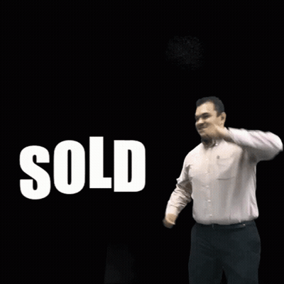 Man In White Shirt Dancing In Front Of Sold GIF
