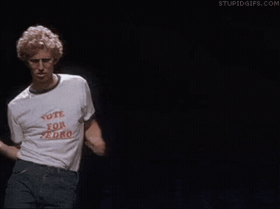 Man In White Shirt Dancing On Stage GIF