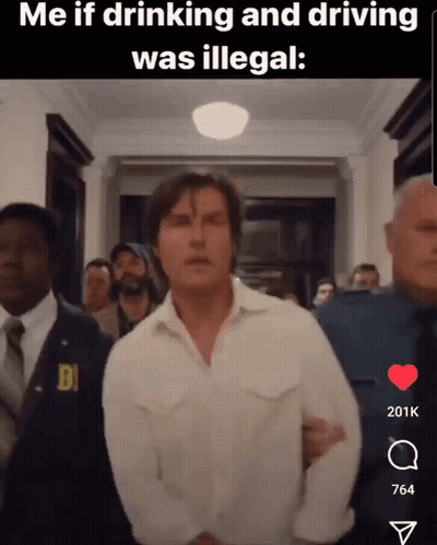 Man In White Shirt Escorted By Police Officer In Hallway GIF