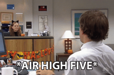 Man In White Shirt Giving Air High Five GIF