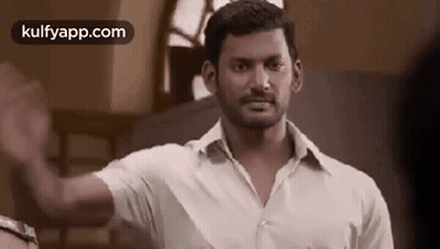 Man In White Shirt Giving High Five GIF