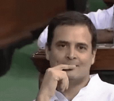 Man In White Shirt Hand To Mouth GIF