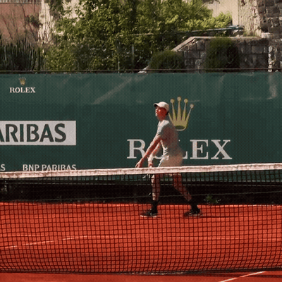Man In White Shirt Helped By Another Man GIF