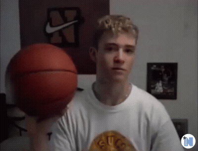 Man In White Shirt Holding Basketball GIF