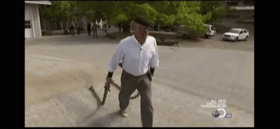 Man In White Shirt Holding Chain GIF