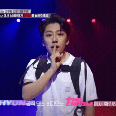 Man In White Shirt Holding Finger To Mouth GIF