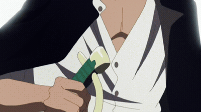 Man In White Shirt Holding Green Object GIF