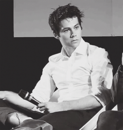 Man In White Shirt Holding Microphone GIF