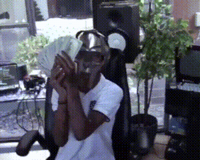 Man In White Shirt Holding Money GIF