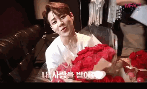 Man In White Shirt Holding Red Roses Sticker