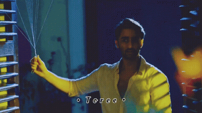 Man In White Shirt Holding String Toree GIF