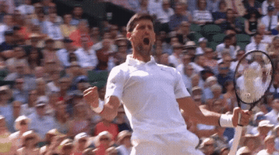 Man In White Shirt Holding Tennis Racquet GIF