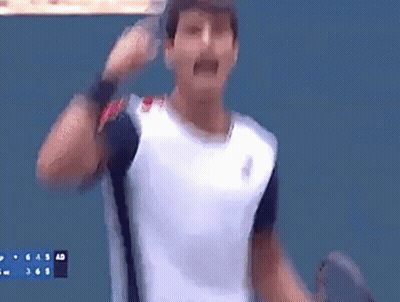 Man In White Shirt Holding Tennis Racquet GIF