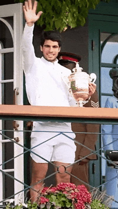 Man In White Shirt Holding Trophy GIF