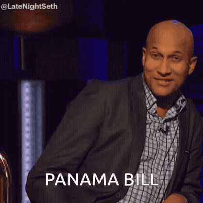 Man In White Shirt Holding Woman In Orange Top GIF