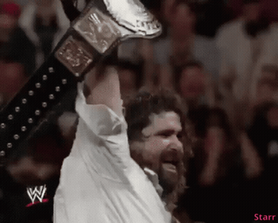 Man In White Shirt Holding Wrestling Belt GIF