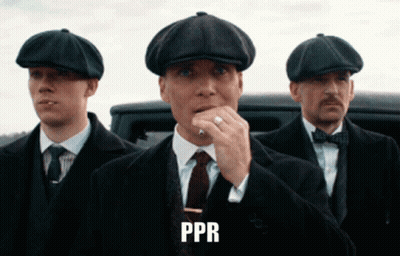 Man In White Shirt In Front Of Jack Ryan Wall GIF
