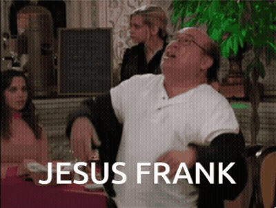 Man In White Shirt In Front Of Jesus Frank Sign GIF