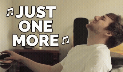 Man In White Shirt In Front Of Just One More Sign GIF