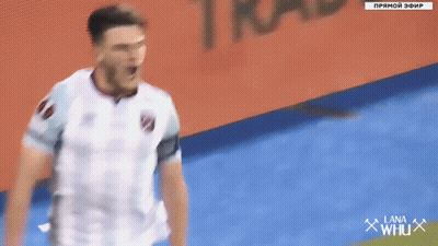 Man In White Shirt In Front Of Lotte Sign GIF