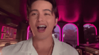 Man In White Shirt In Pink Room GIF