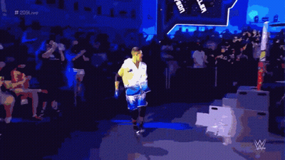 Man In White Shirt Johnson Enters Wrestling Ring GIF