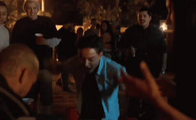 Man In White Shirt Laughing With Chinese Characters GIF